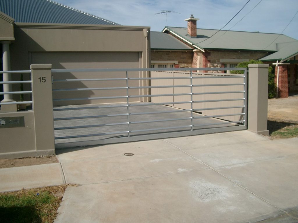 Automated electric sliding driveway gates, contemporary design