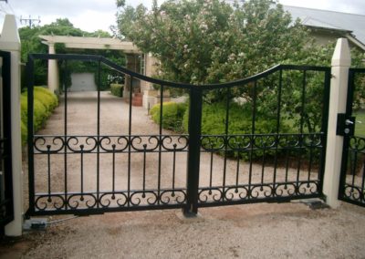 interesting-contemporary-design-double-driveway-gates-with-lockable-single-entrance-gate-set-at-an-angle-of-45-degrees