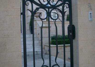 ornate-lockable-modern-design-steel-gate-entrance-to-pathway-before-staircase
